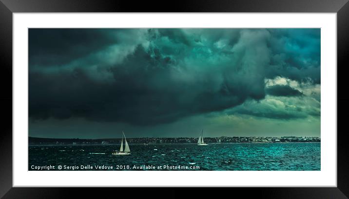 The thunderstorm on the sea Framed Mounted Print by Sergio Delle Vedove