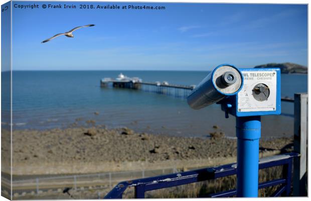 Telescope overlooking Llandudno pier. Canvas Print by Frank Irwin