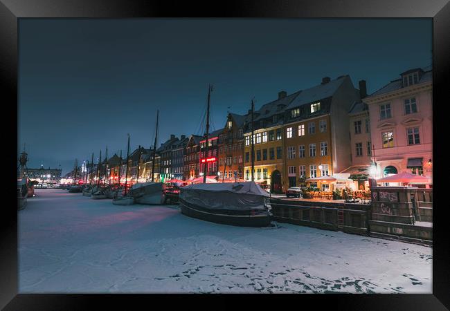 Frozen Nyhavn canal in winter Framed Print by Dalius Baranauskas