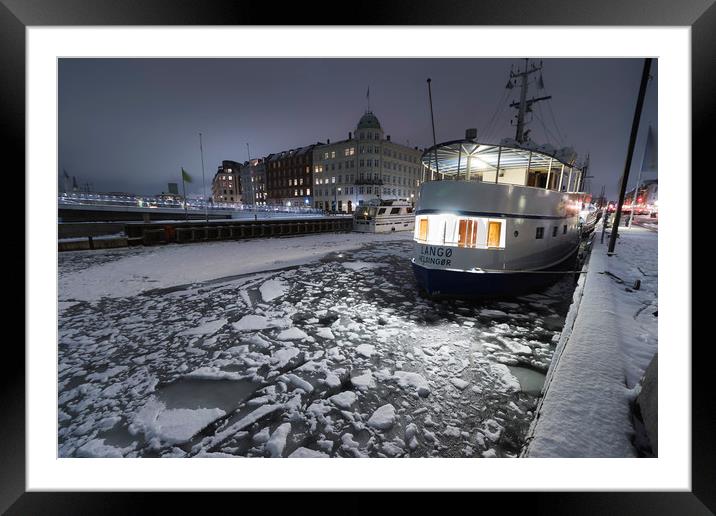 Frozen Nyhavn canal in winter Framed Mounted Print by Dalius Baranauskas