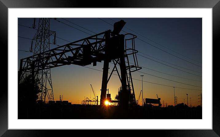 Sun Down Through The Dockland Framed Mounted Print by Louise Godwin