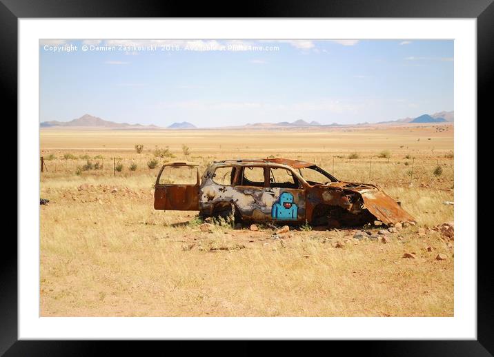 Abandoned car somewhere in Namibia Framed Mounted Print by Damien Zasikowski