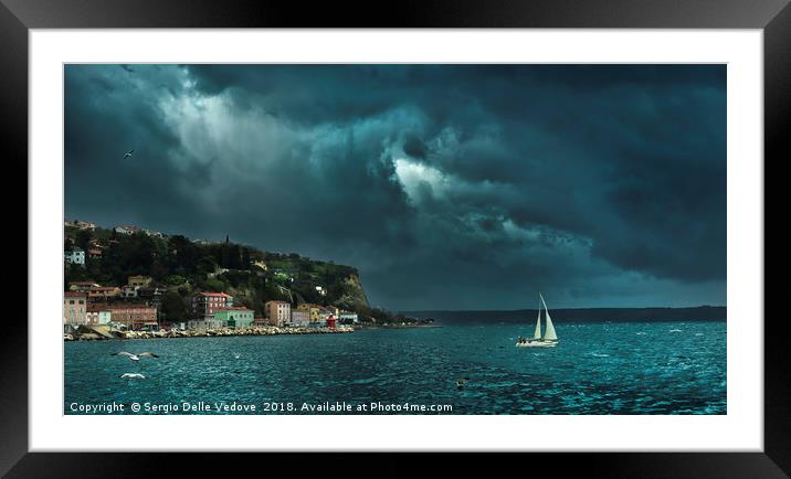 The thunderstorm on the sea Framed Mounted Print by Sergio Delle Vedove