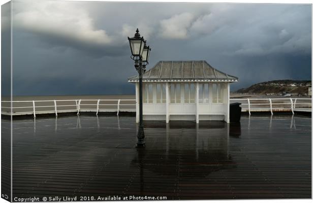Stormy day at Cromer Pier Canvas Print by Sally Lloyd