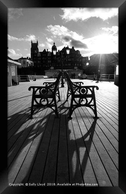 Cromer pier shadows Framed Print by Sally Lloyd