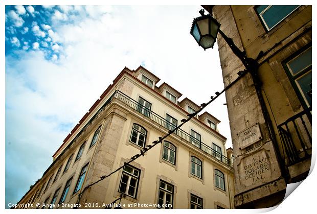 Lisbon colors at the famous Rua Augusta Print by Angela Bragato