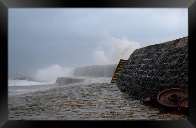 Waves over the Cobb Framed Print by David Neighbour
