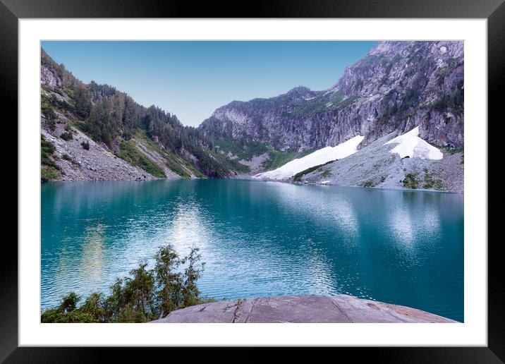 Glacier lake with mountains and snow during summer Framed Mounted Print by Thomas Baker