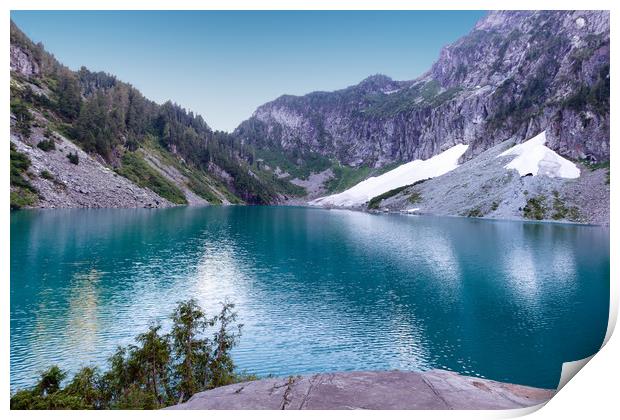 Glacier lake with mountains and snow during summer Print by Thomas Baker