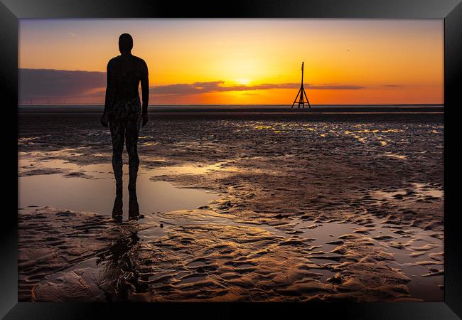 Sunset across Crosby Beach  Framed Print by Andrew George