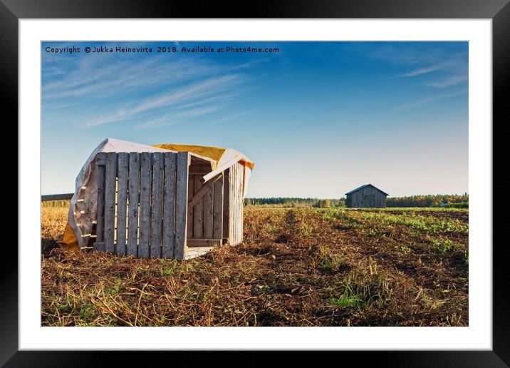 Fallen Crates On An Autumn Field Framed Mounted Print by Jukka Heinovirta