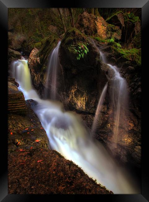 Waterfall behind Dinas Rock Framed Print by Leighton Collins