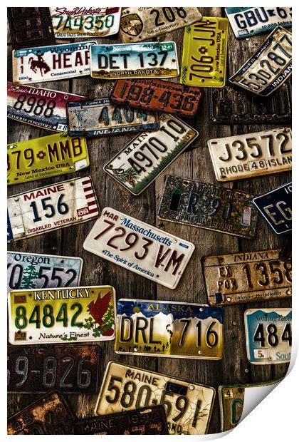 License Plates on Old Wall Print by Darryl Brooks