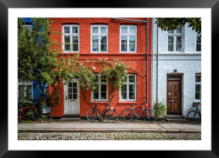 Picturesque colorful houses in Copenhagen Framed Mounted Print by Juan Jimenez