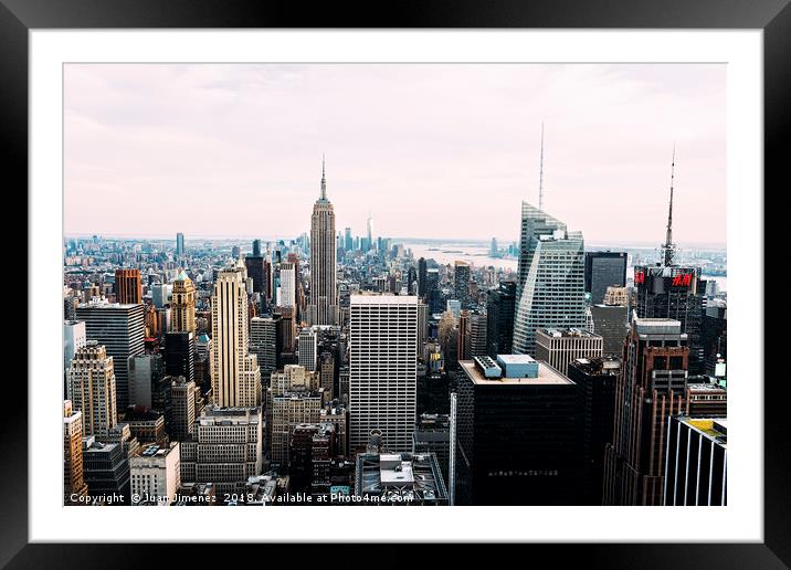 Skyline of New York City at Sunset Framed Mounted Print by Juan Jimenez