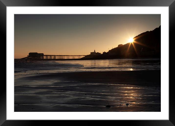 Starburst sunrise at Mumbles Pier Framed Mounted Print by Leighton Collins