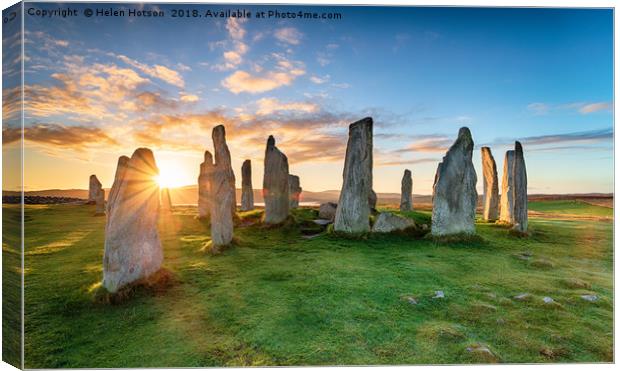 Stunning sunset over the Callanish stone circle on Canvas Print by Helen Hotson