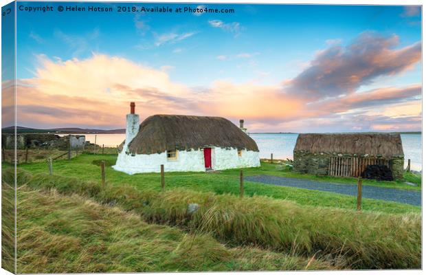 Thatched Cottage on Uist in Scotland Canvas Print by Helen Hotson