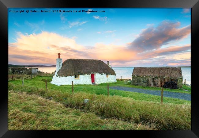Thatched Cottage on Uist in Scotland Framed Print by Helen Hotson