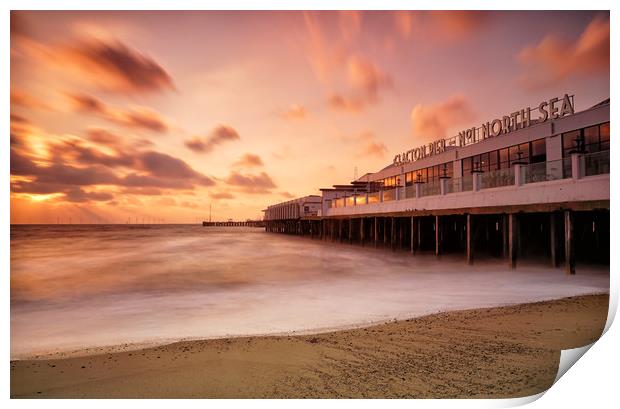 Clacton on Sea Pier at sunrise Print by Rob Woolf