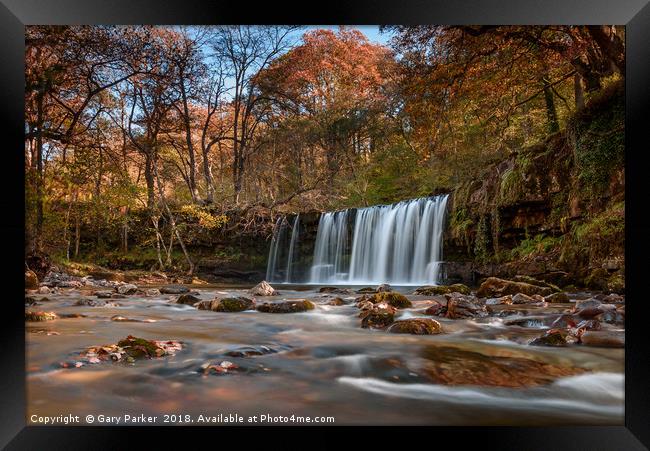 Waterfall in the Autumn Framed Print by Gary Parker