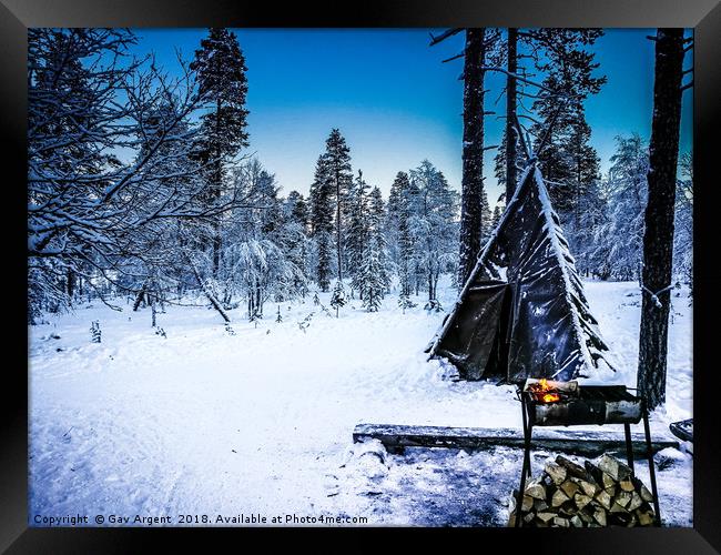 Tee Pee in the snow Framed Print by Gav Argent