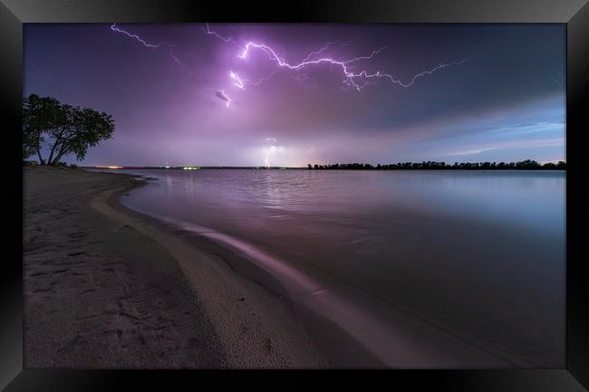 Lake McConaughy lightning, Nebraska  Framed Print by John Finney