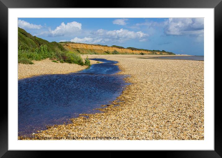A small stream on an English shell beach Framed Mounted Print by Michael Harper