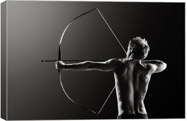 Male archer drawing long bow Canvas Print by Johan Swanepoel