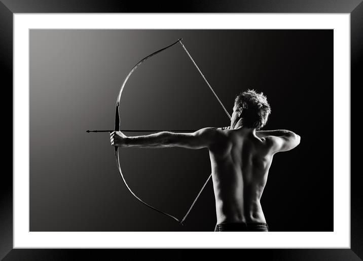 Male archer drawing long bow Framed Mounted Print by Johan Swanepoel