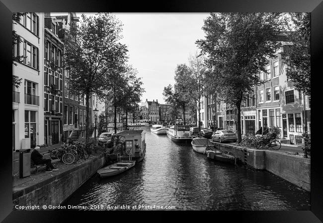 Amsterdam Canal in Black and White Framed Print by Gordon Dimmer