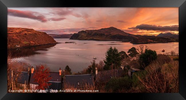 East view over house rooves as the sun goes down  Framed Print by Richard Smith