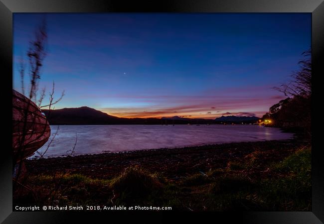 Loch Portree sunrise viewed from the grassy shore  Framed Print by Richard Smith