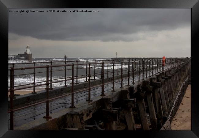 The Old Wooden Pier on a stormy morning Framed Print by Jim Jones