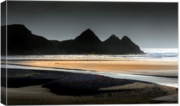 Grey sky at Three Cliffs Bay Canvas Print by Leighton Collins