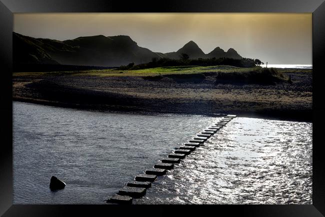 Stepping stones at Three Cliffs Bay Framed Print by Leighton Collins