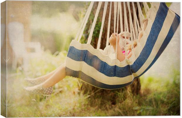 Little Girl  in Swing Canvas Print by Maggie McCall