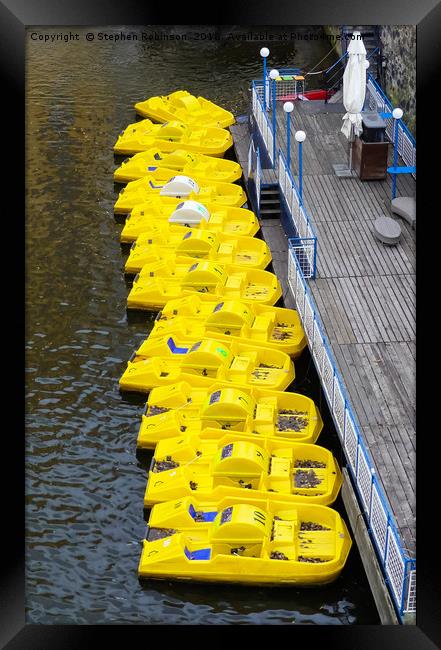 Yellow pedalos at rest Framed Print by Stephen Robinson