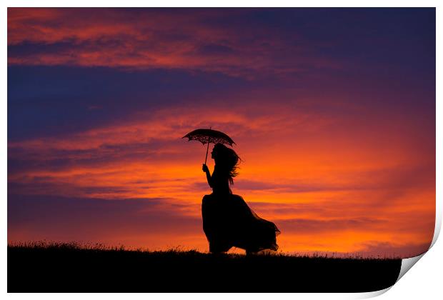 Silhouette of young woman running at sunset Print by Maggie McCall