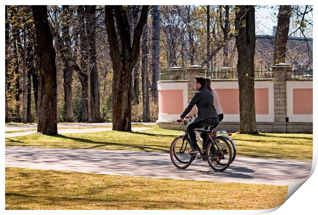 Riding A Bike In The Park Print by Jukka Heinovirta