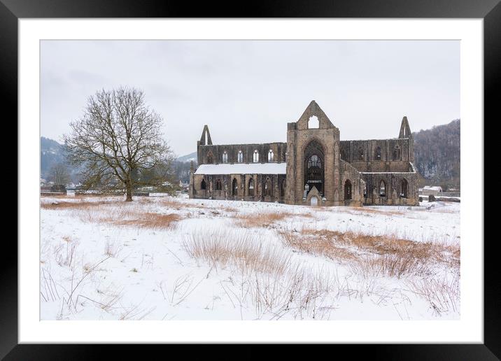 Tintern Abbey is the snow Framed Mounted Print by Dean Merry