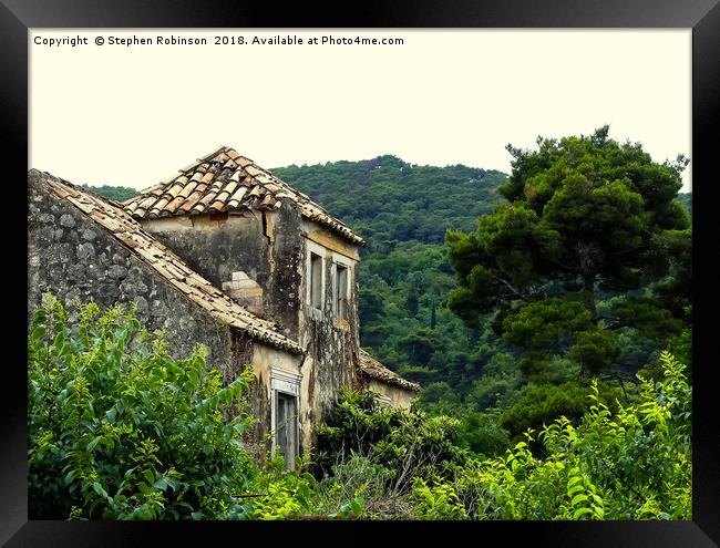 Derelict stone building with a wooded hillside Framed Print by Stephen Robinson