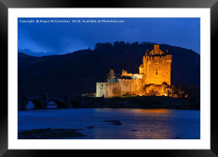 Eilean Donan Castle at twilight Framed Mounted Print by Angus McComiskey