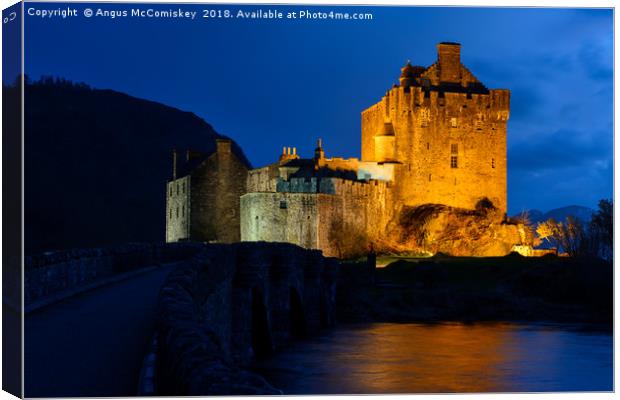 Twilight over Eilean Donan Castle Canvas Print by Angus McComiskey