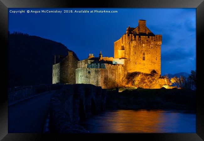Twilight over Eilean Donan Castle Framed Print by Angus McComiskey