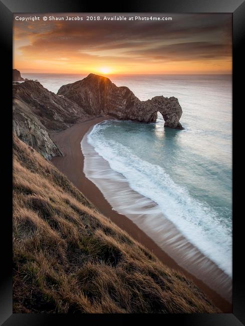 Warming Winter sunrise at Durdle Door  Framed Print by Shaun Jacobs