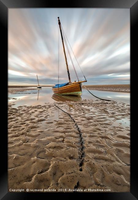 Boats on a Low Tide Framed Print by raymond mcbride