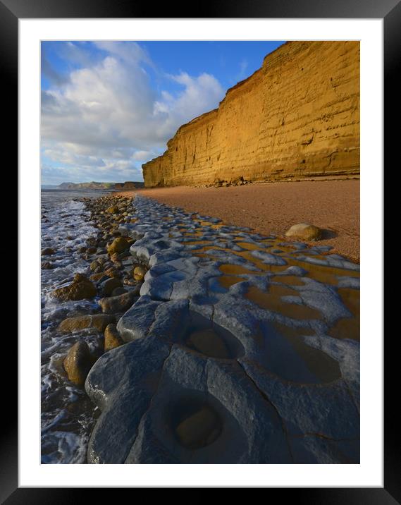 Golden cliff reflections Framed Mounted Print by David Neighbour