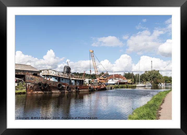 Boat yard Framed Mounted Print by Mike Hughes