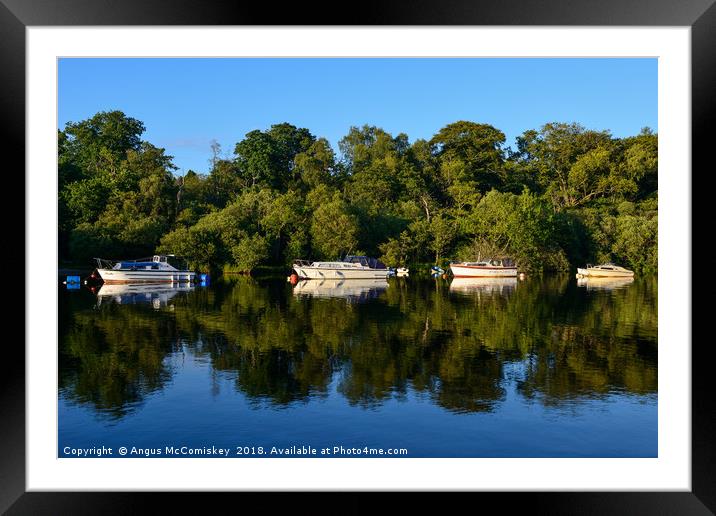 Boats at anchor on the River Leven at Balloch Framed Mounted Print by Angus McComiskey